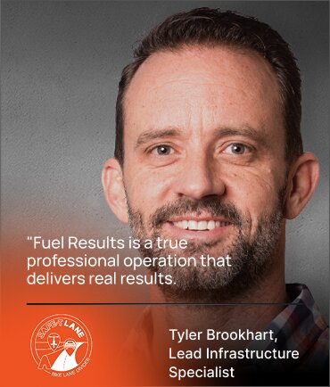 A man with short brown hair and a beard smiles at the camera. Text reads: “Fuel Results is a true professional operation that delivers real results.” Below is the name Tyler Brookhart, Lead Infrastructure Specialist, and a Bike Lane logo.